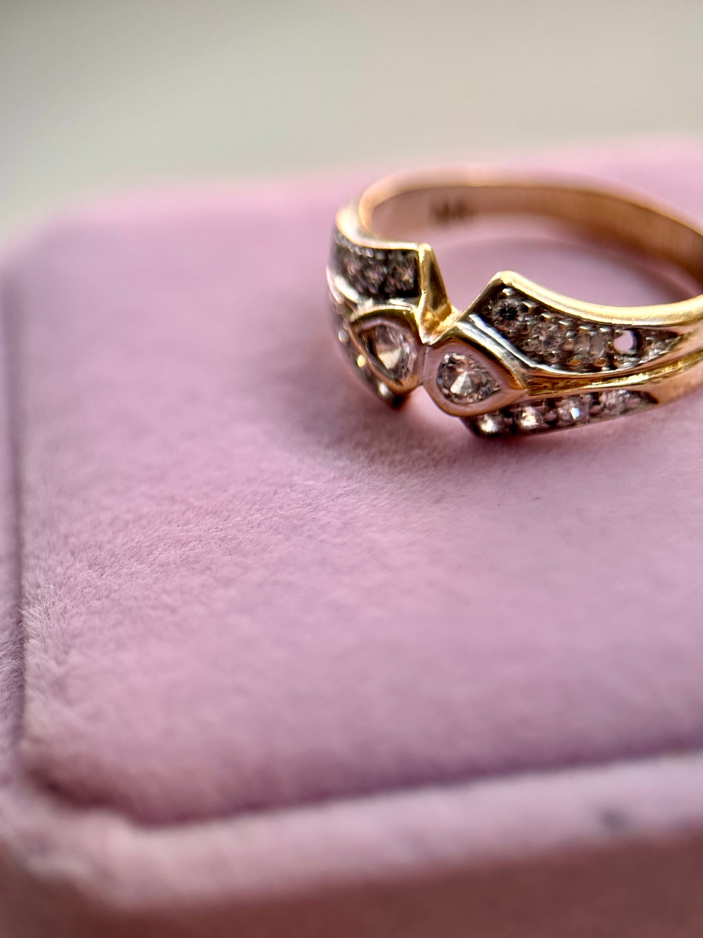 Two solitaire gold and diamond Ring